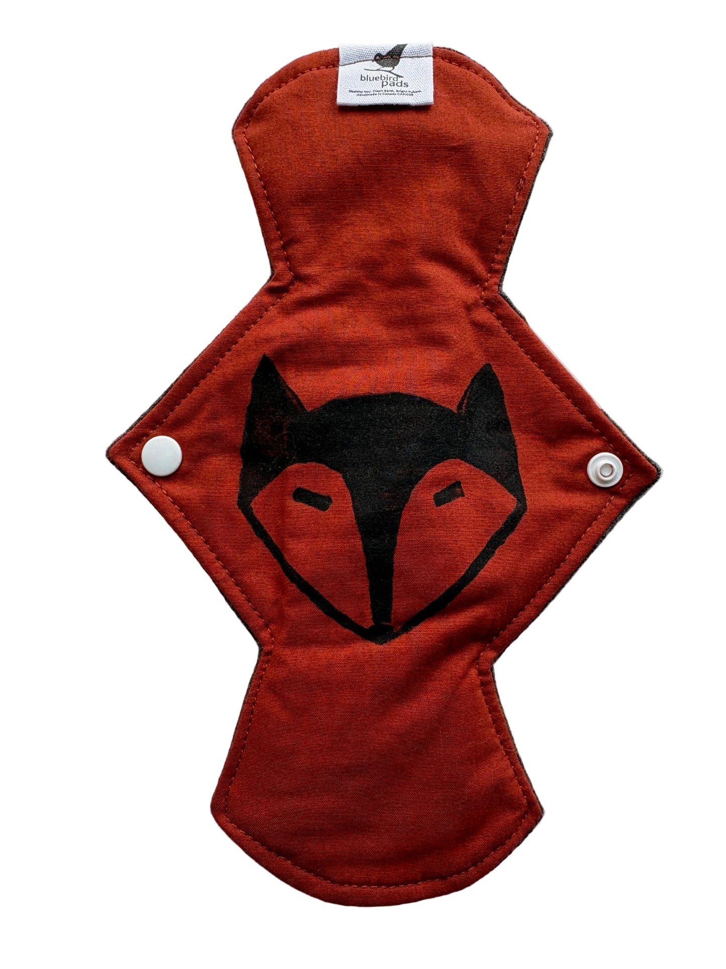 Brick Orange cloth pad with a black fox stamp design 