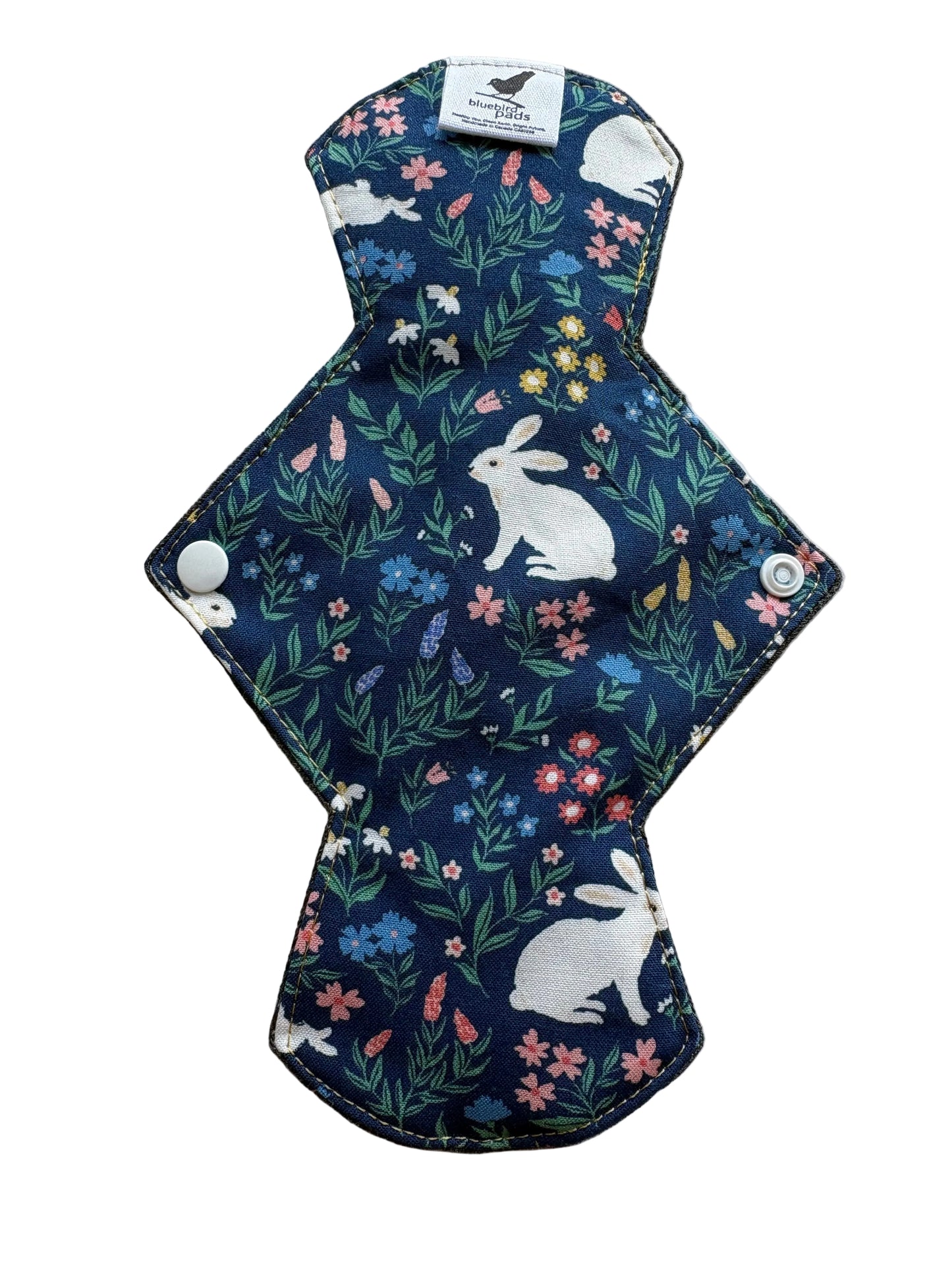 Reusable menstrual pad with rabbit and floral pattern 