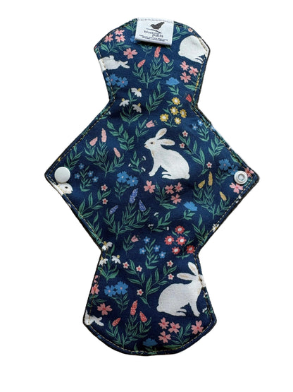 Reusable menstrual pad with rabbit and floral pattern 