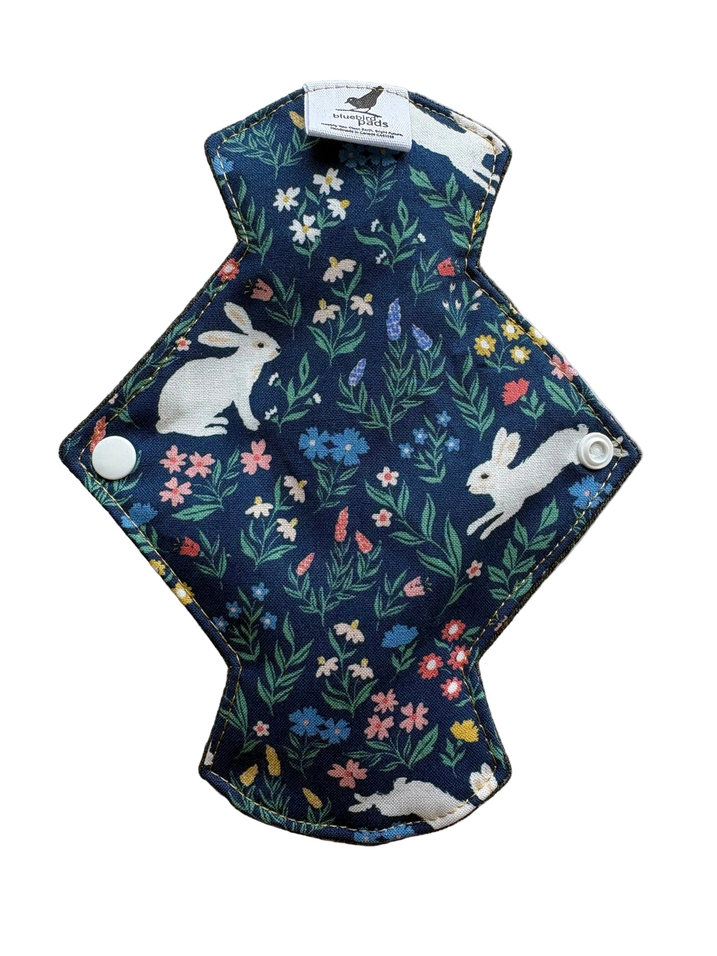 Reusable menstrual pad with floral and rabbit pattern 