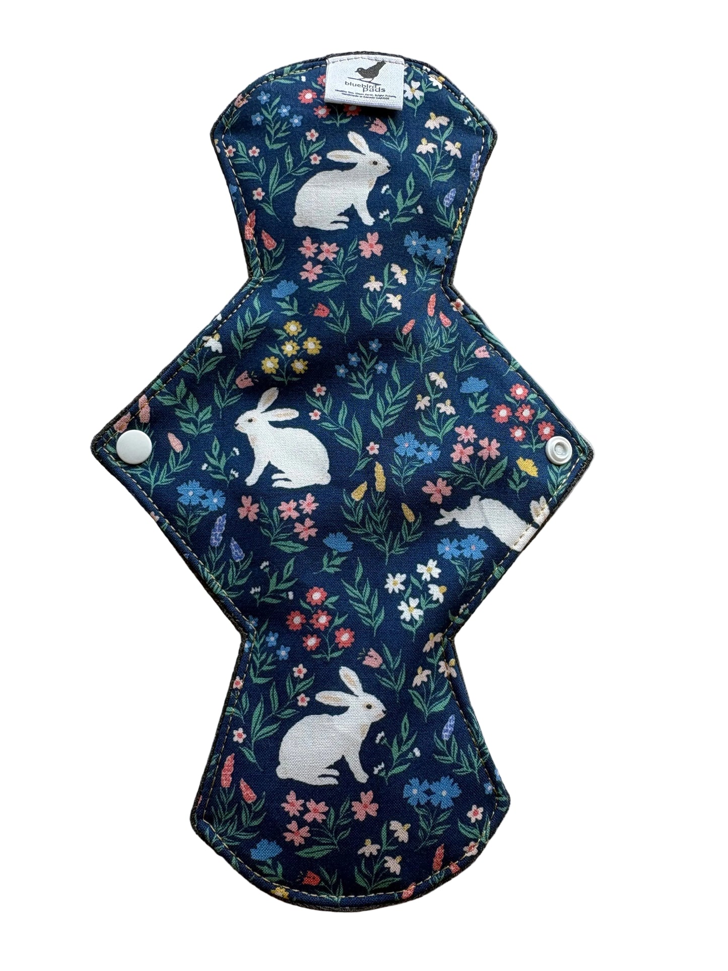 Reusable menstrual pad with rabbit and floral pattern 