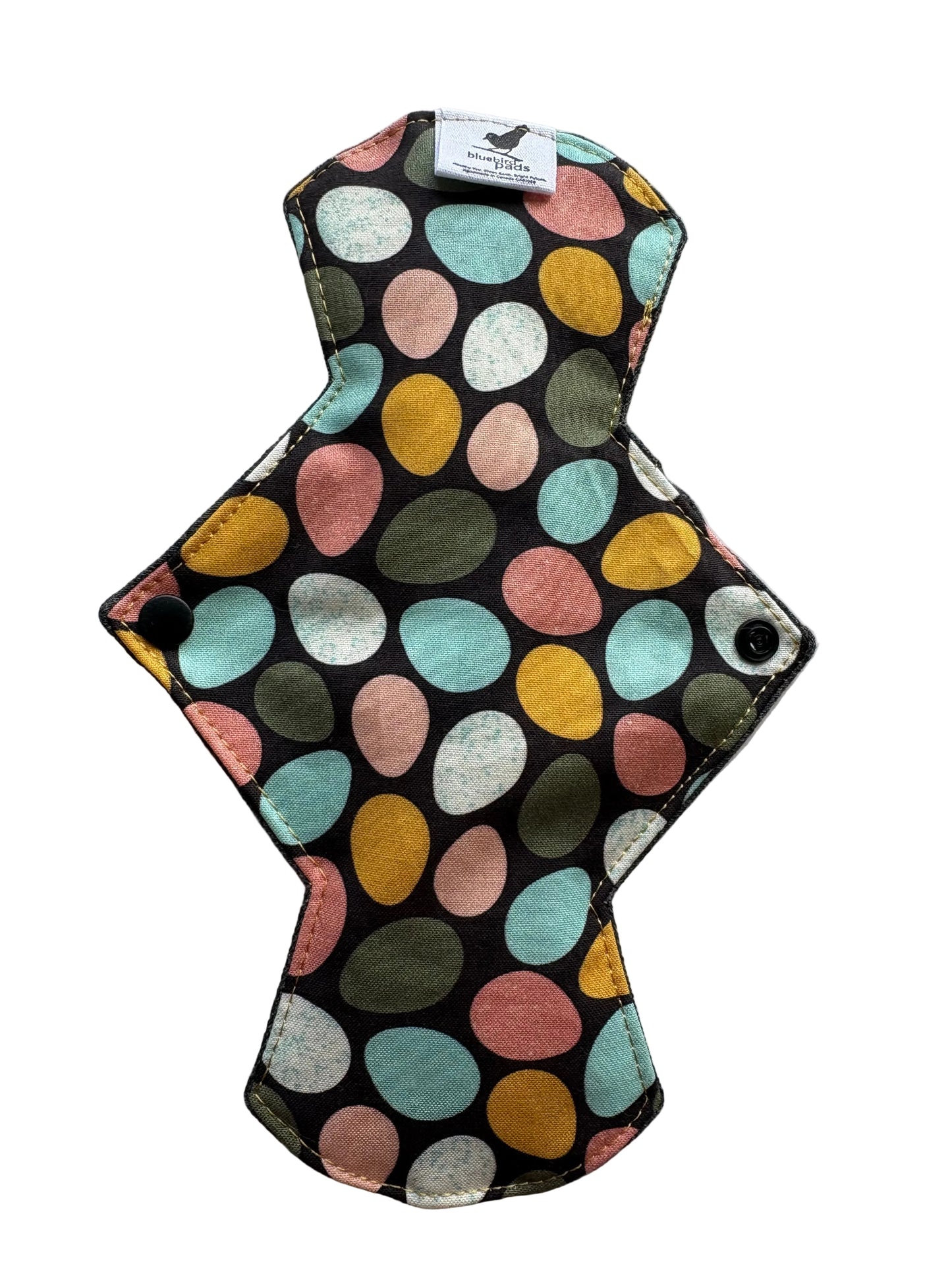 Multicolored egg patterned cloth pad 