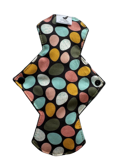 Multicolored egg patterned cloth pad 
