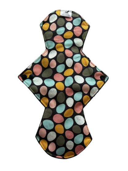 Reusable menstrual night size pad with colorful egg pattern 