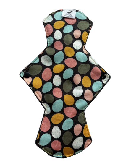 Reusable menstrual pad with colorful Egg pattern