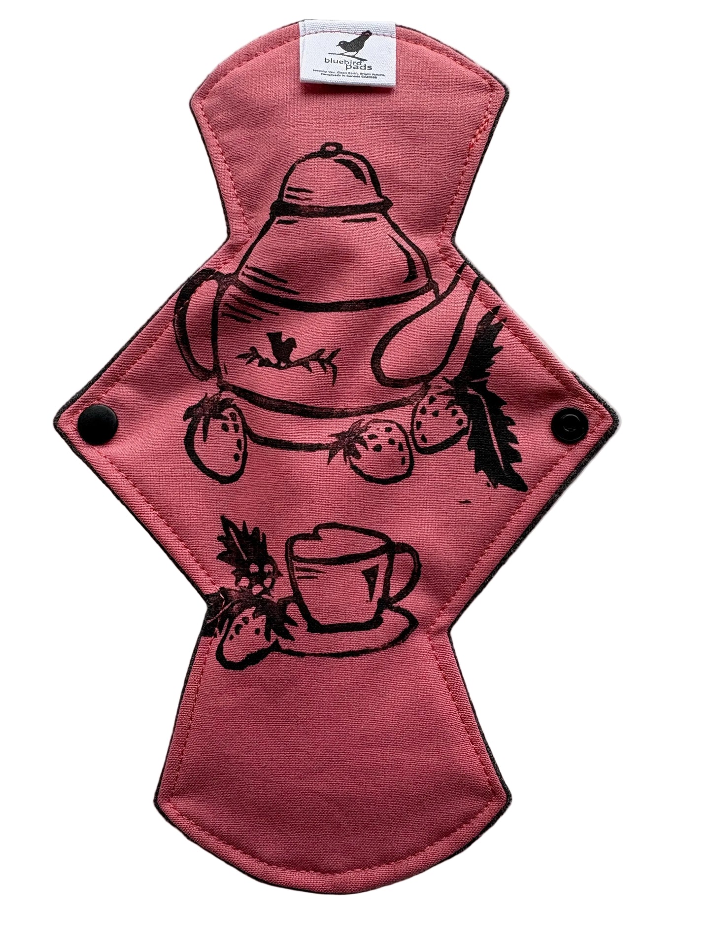 Salmon pink cloth pad with black tea party themed stamp design 