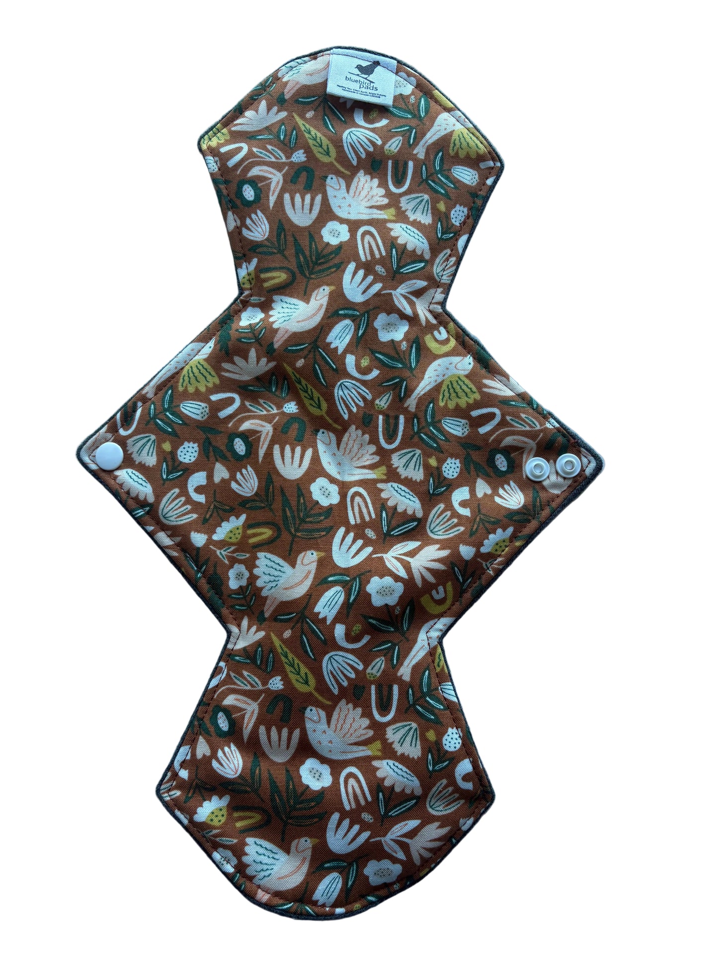 Eco Friendly Reusable menstrual pad with nature-themed pattern 