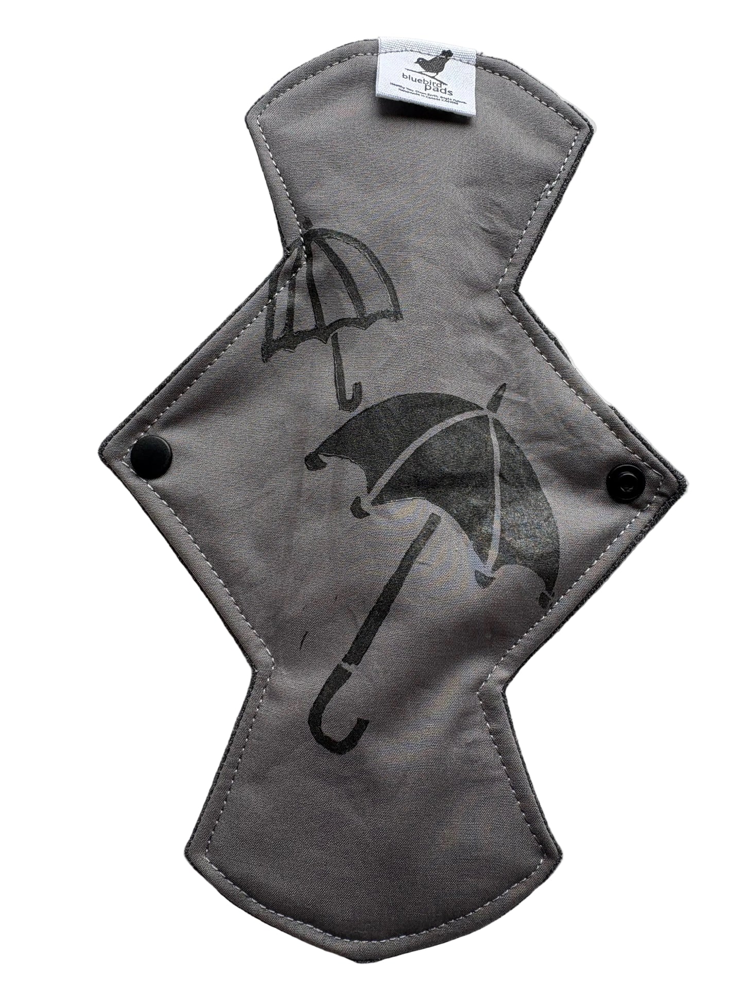 Gray cotton cloth pad with black umbrella stamp design 