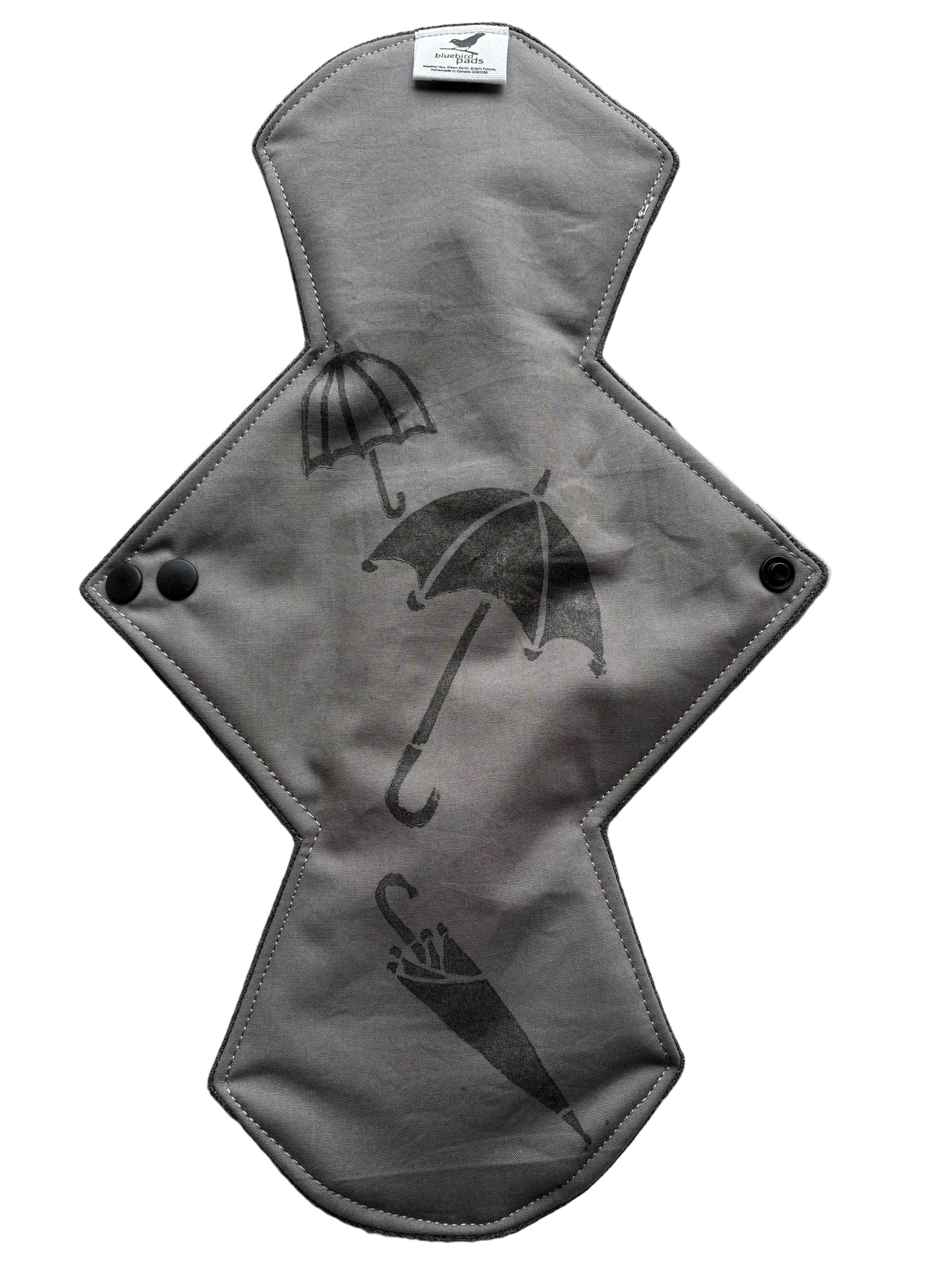 Grey cloth pad with umbrella stamp pattern 